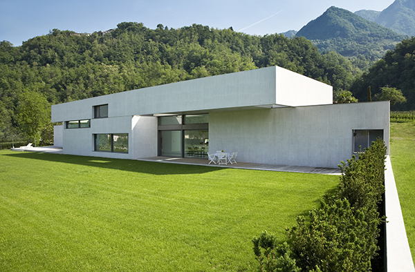 Outdoors modern minimalist house with a flat roofing system