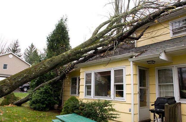 storm-damaged home